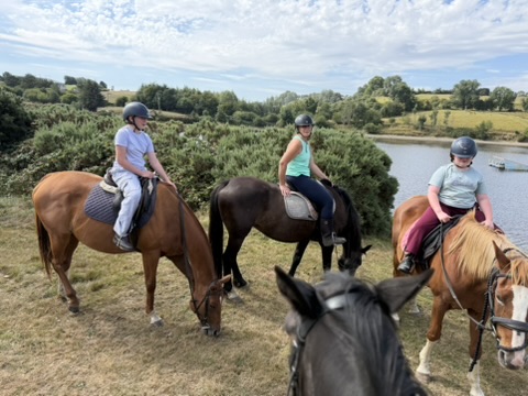 Horseback riding through the countryside.